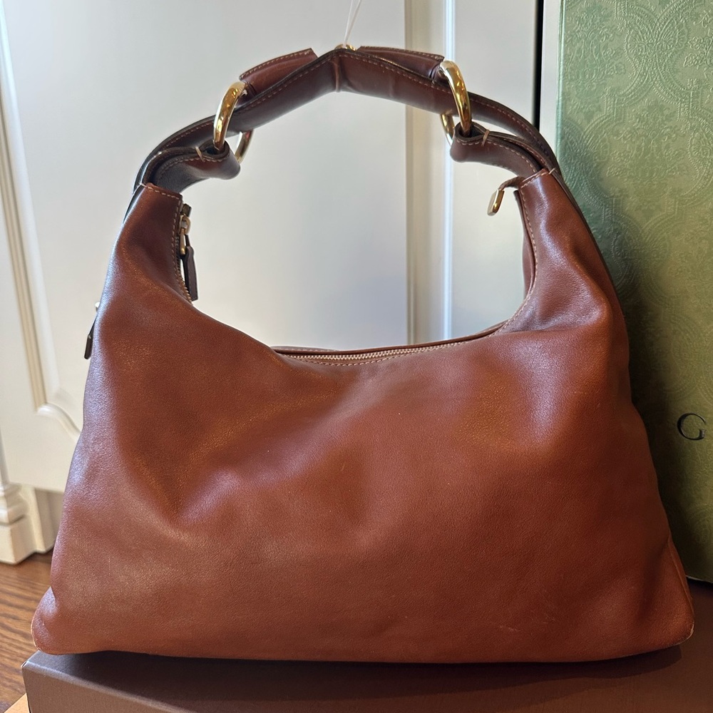 Classic GUCCI Carmel colored leather horsebit bag. in Great pre owned condition